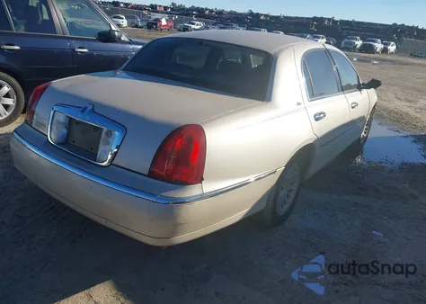 2000 Lincoln Town Car Cartier from USA, damaged, VIN 1LNHM83W2YY913874